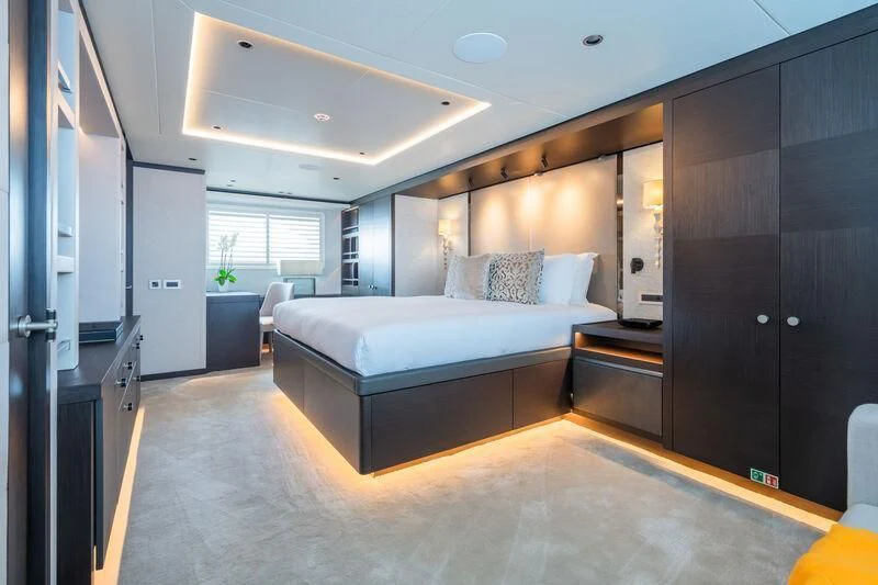 a large bedroom with a large bed aboard EMERALD Yacht for Charter