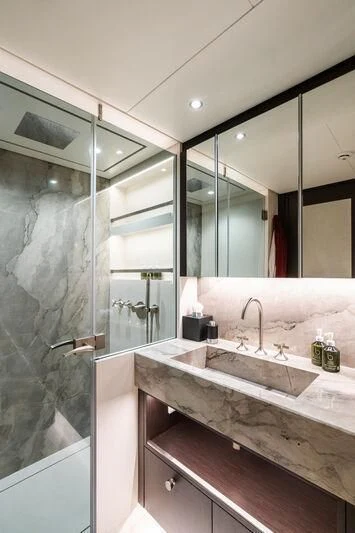 a bathroom with a large mirror aboard EMERALD Yacht for Charter