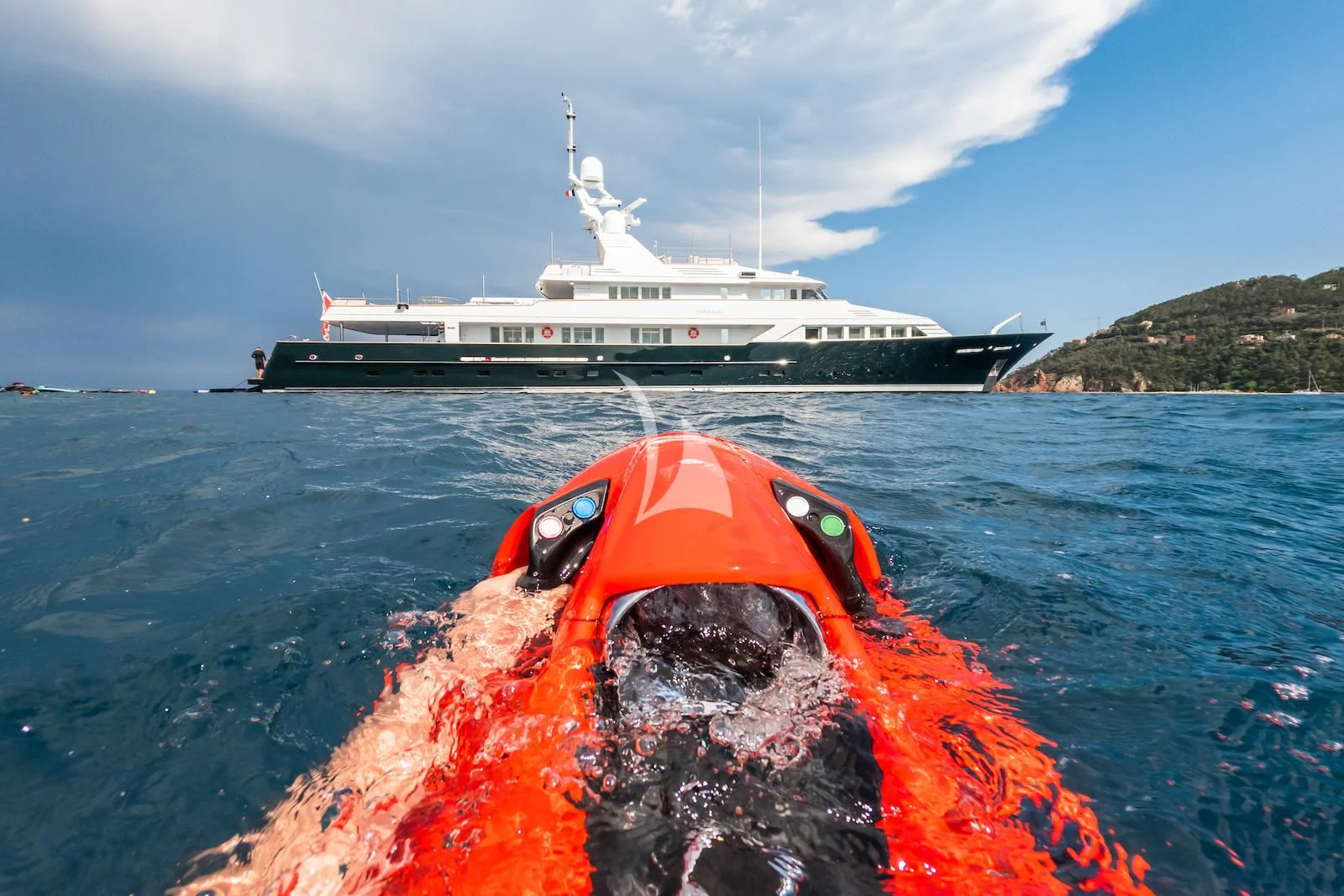 a red and black boat on water aboard EMERALD Yacht for Charter