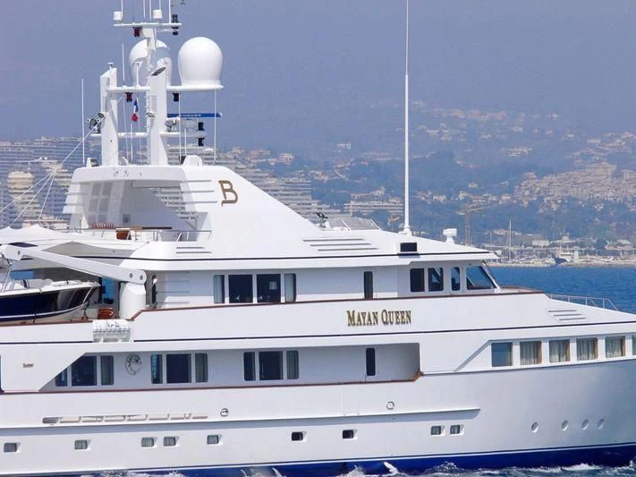 a large white boat in the water aboard EMERALD Yacht for Charter