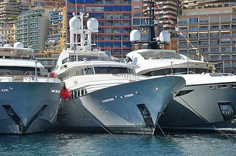 a couple of boats are parked in the water aboard EMERALD Yacht for Charter