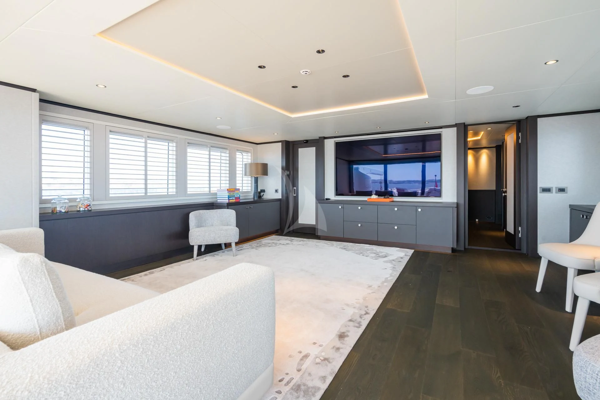 a large living room with a large open floor plan aboard EMERALD Yacht for Charter