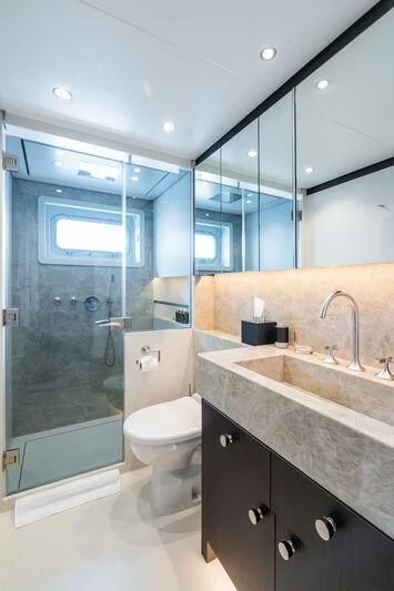 a bathroom with a glass shower aboard EMERALD Yacht for Charter