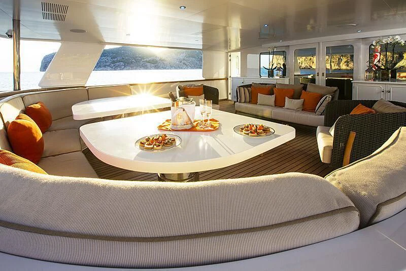 a large white table with food on it aboard EMERALD Yacht for Charter