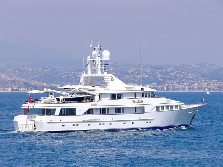 a white boat in the water aboard EMERALD Yacht for Charter