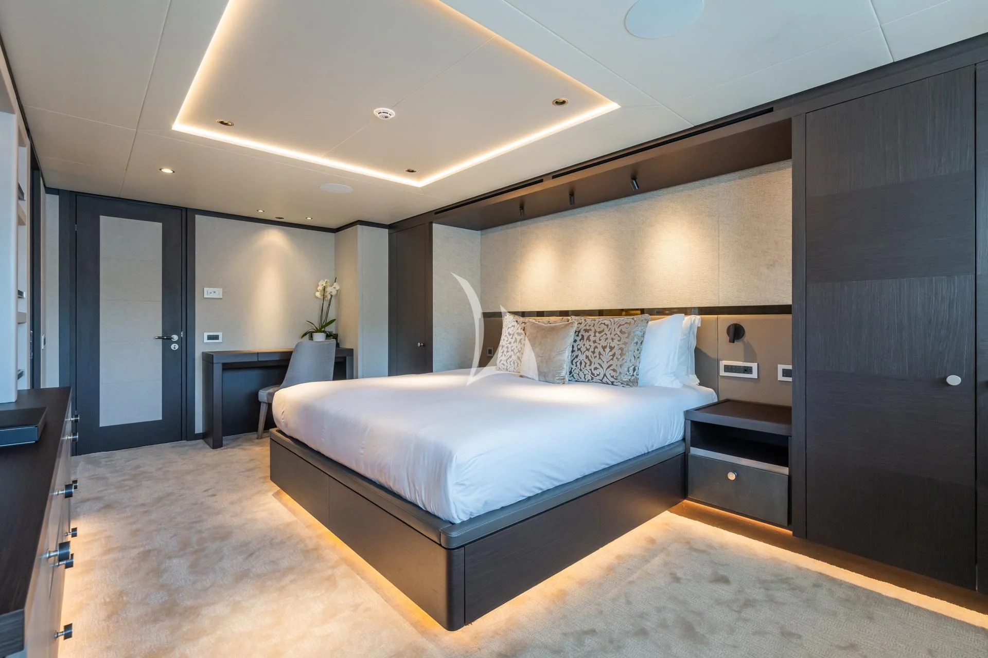 a large bed in a room aboard EMERALD Yacht for Charter