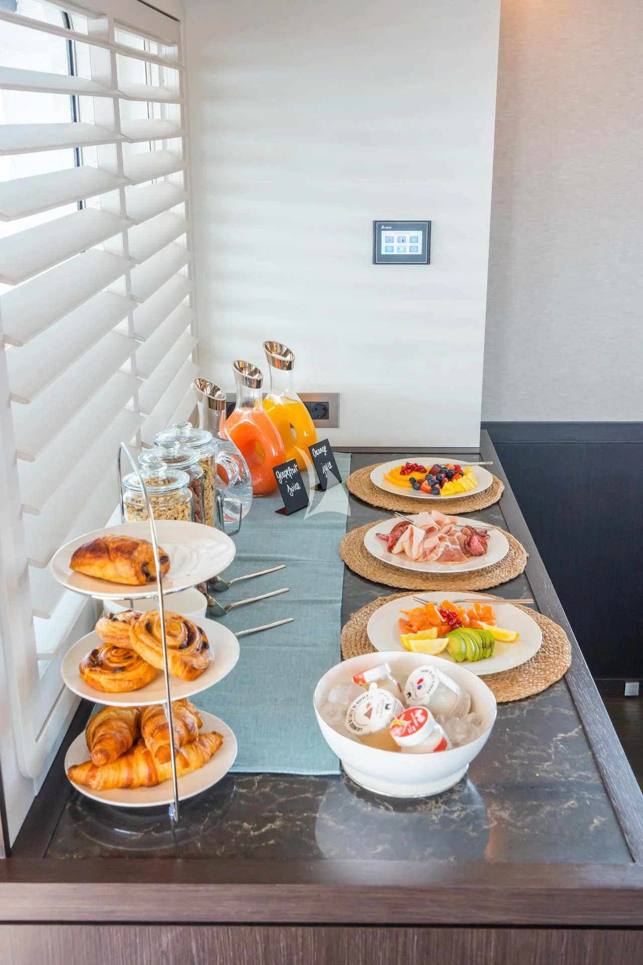 a table with food on it aboard EMERALD Yacht for Charter