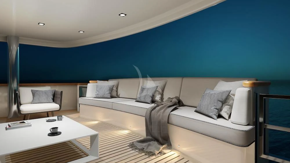 a room with a bed and a table aboard EMERALD Yacht for Charter