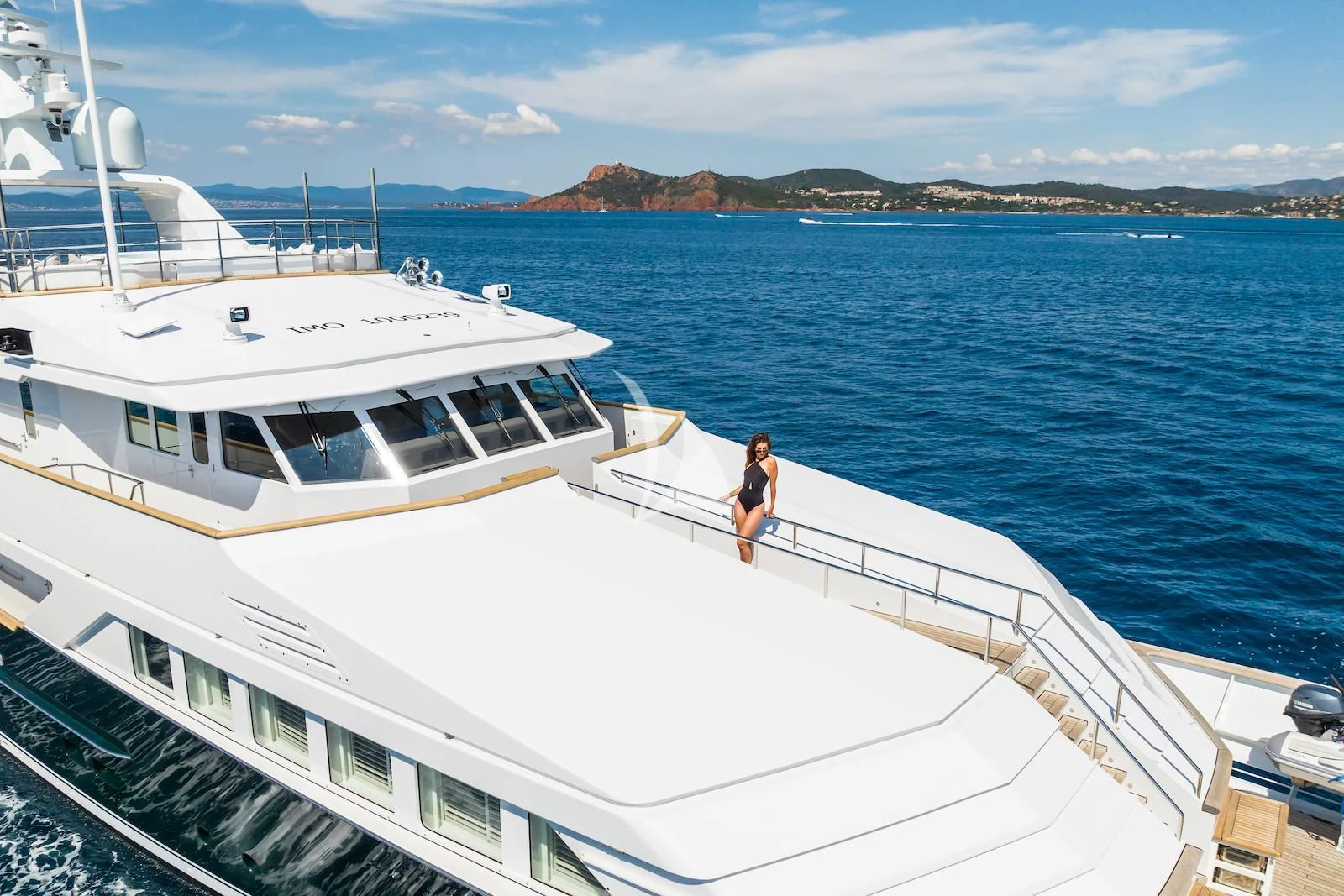 a person standing on a boat aboard EMERALD Yacht for Charter