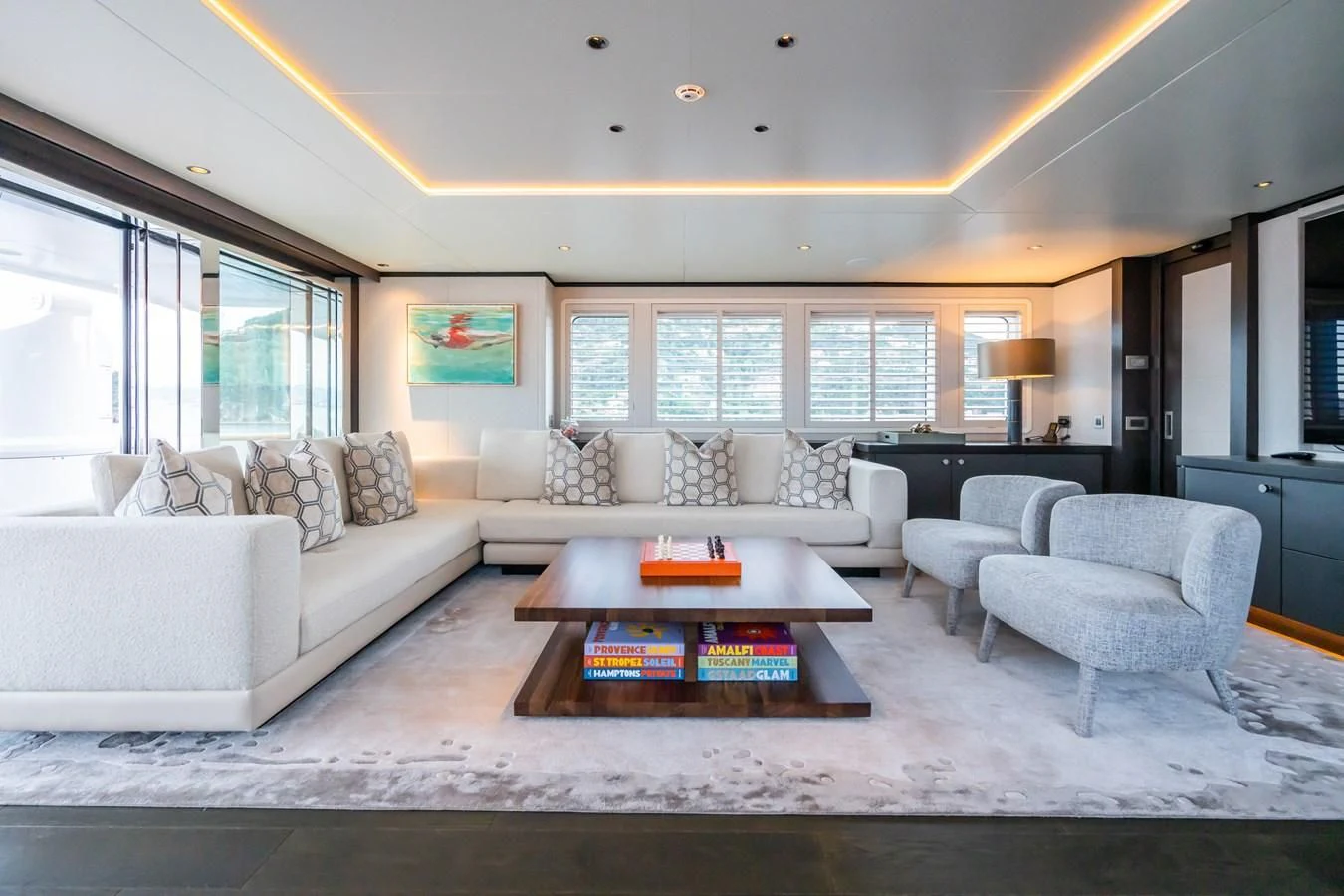 a living room with a large window aboard EMERALD Yacht for Charter