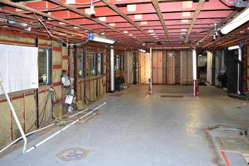 a warehouse with a lot of equipment aboard EMERALD Yacht for Charter