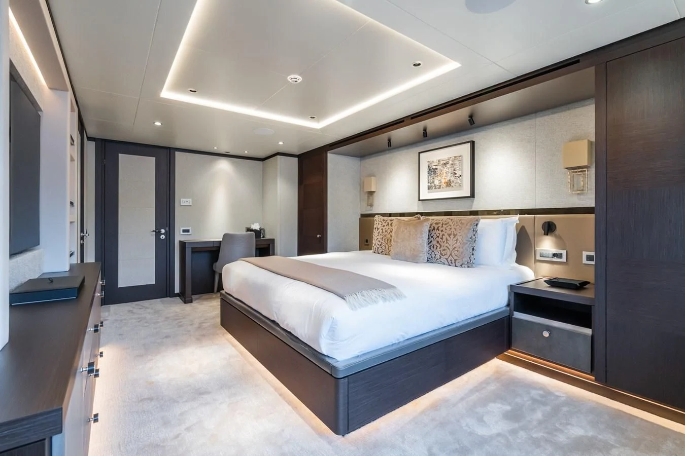 a large bedroom with a large bed aboard EMERALD Yacht for Charter