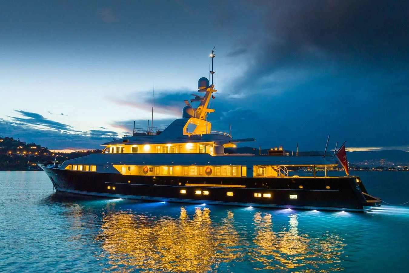 a yellow and black boat on water aboard EMERALD Yacht for Charter