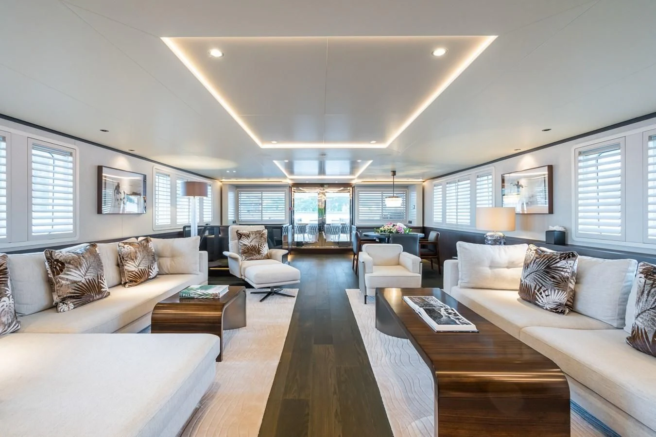 a living room with a large window aboard EMERALD Yacht for Charter