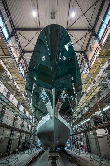 a large metal ball in a factory aboard EMERALD Yacht for Charter