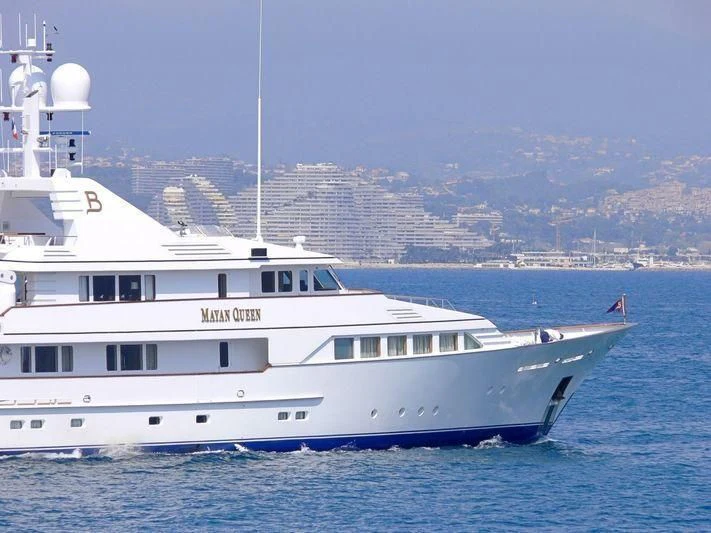 a large white boat in the water aboard EMERALD Yacht for Charter