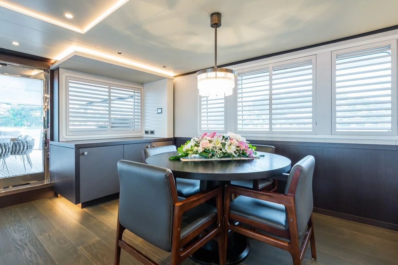 a kitchen with a dining table aboard EMERALD Yacht for Charter