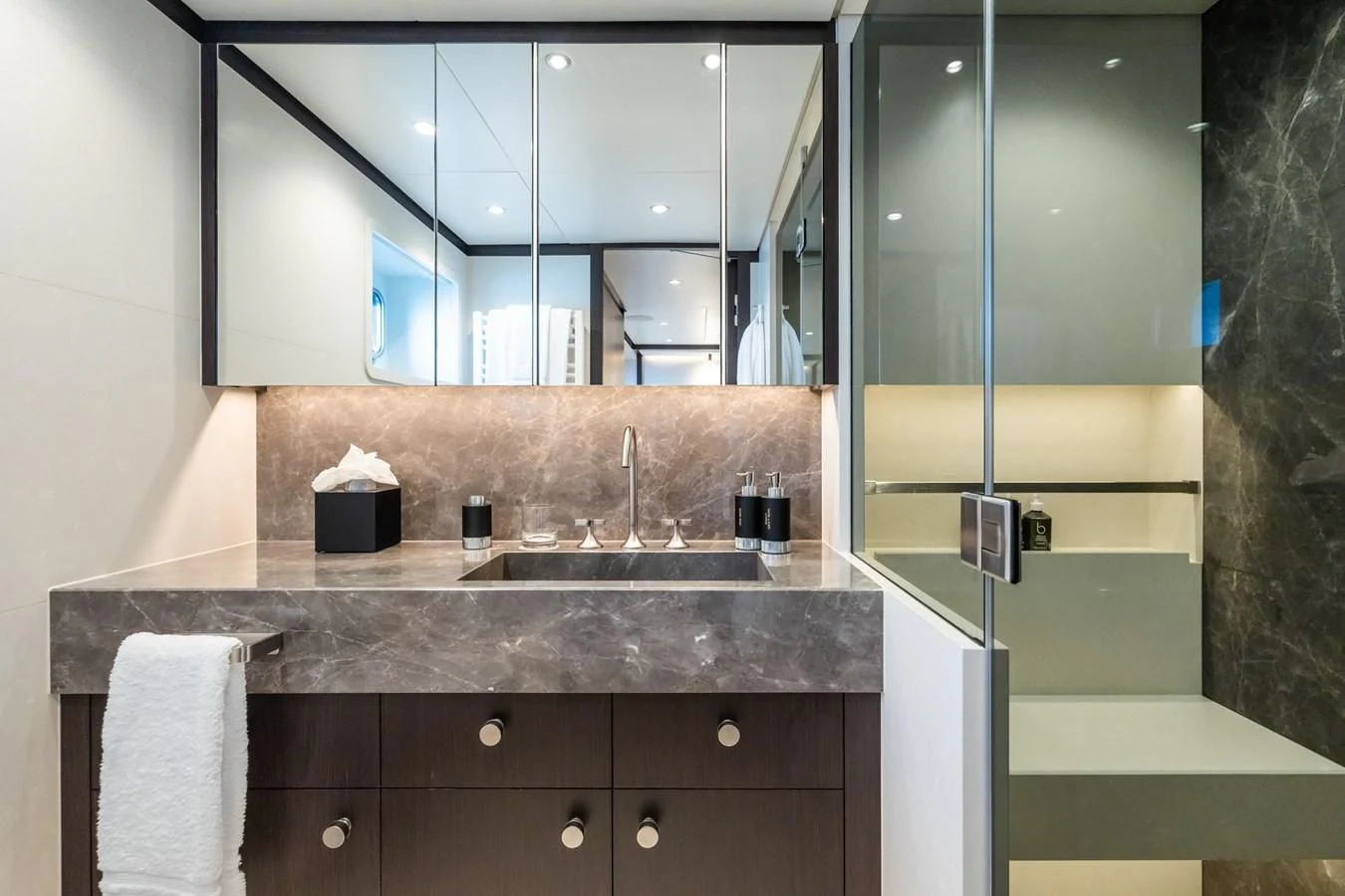 a bathroom with a glass shower aboard EMERALD Yacht for Charter