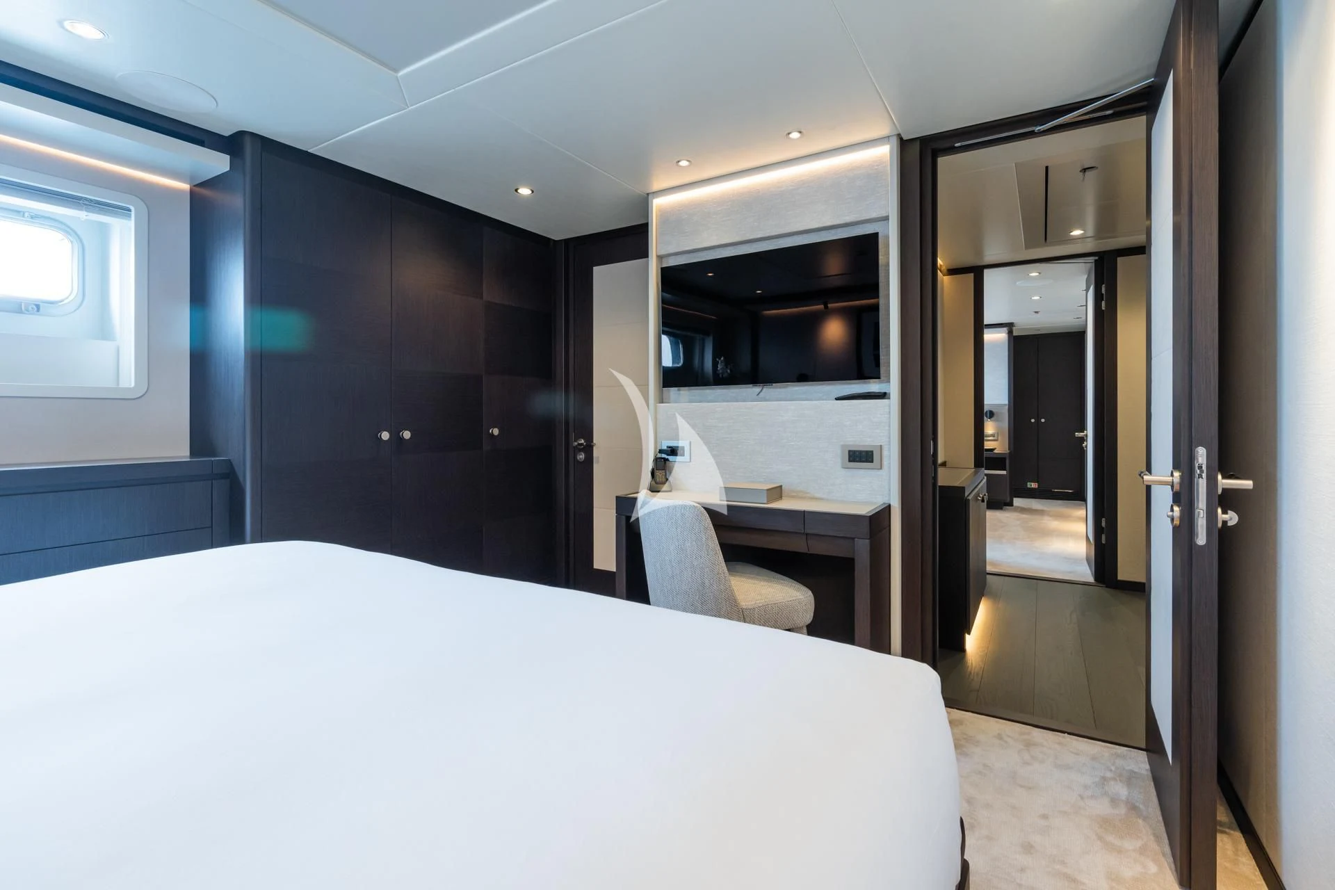 a large room with a table and chairs aboard EMERALD Yacht for Charter