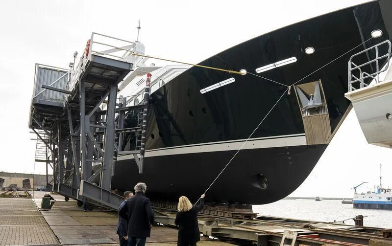 a large boat on a dock aboard EMERALD Yacht for Charter
