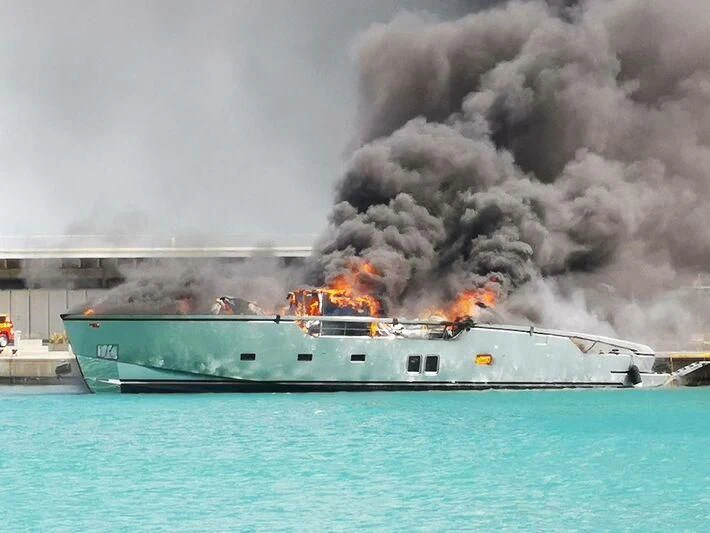 a large ship on fire aboard PESA Yacht for Sale