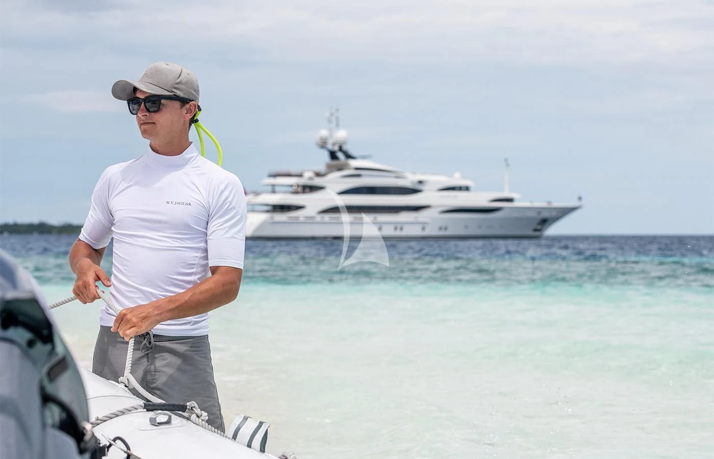 a man on a boat aboard JAGUAR Yacht for Charter