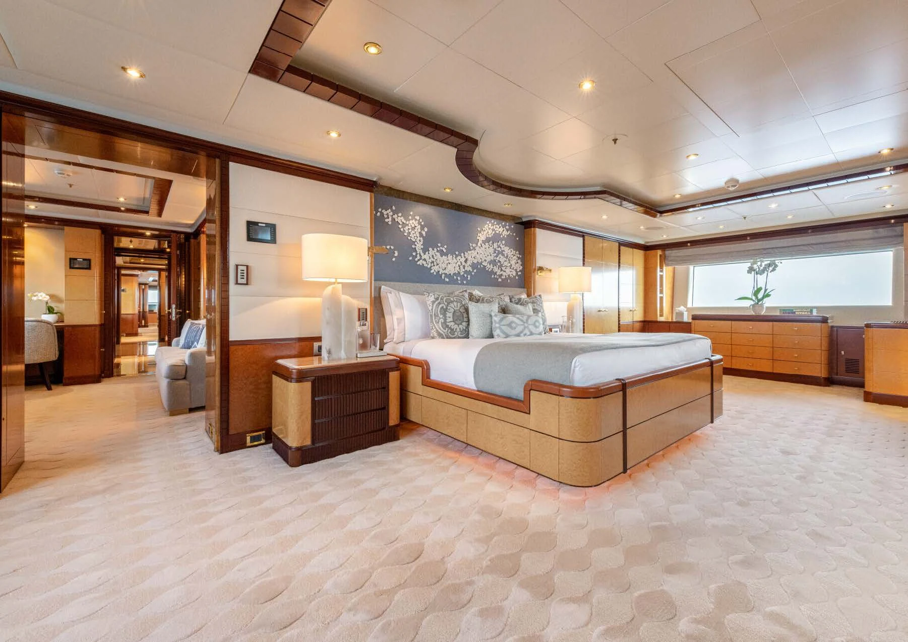 a large bedroom with a large bed aboard JAGUAR Yacht for Charter