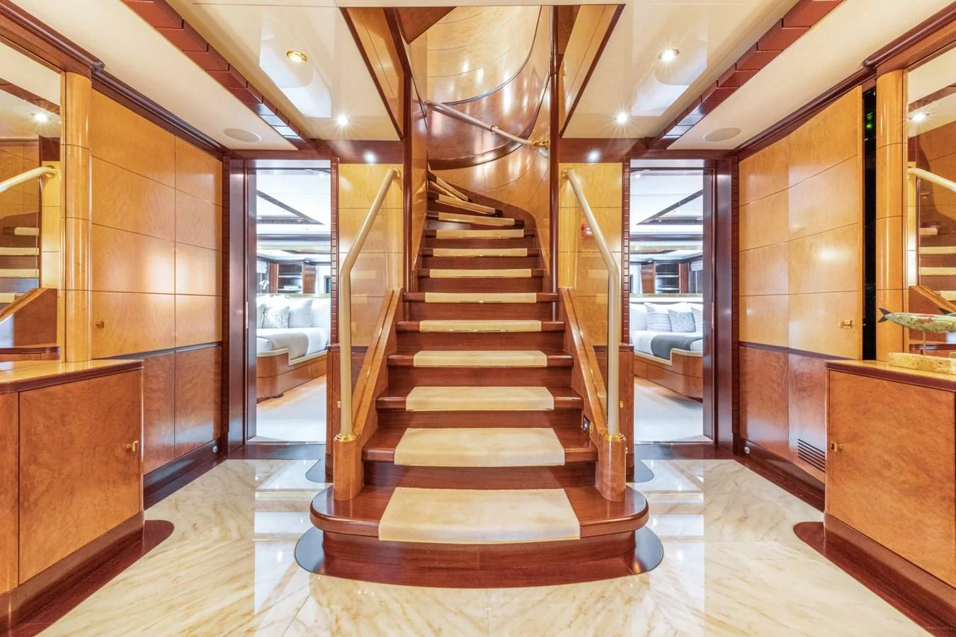 a long hallway with a set of stairs aboard JAGUAR Yacht for Charter