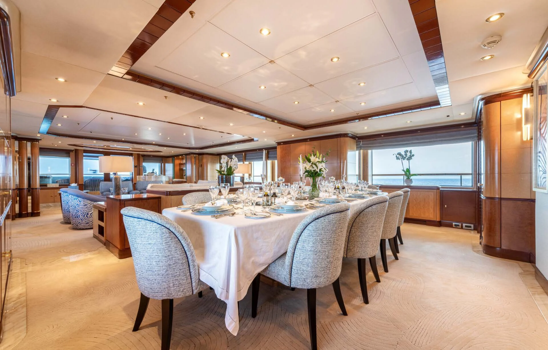 a large dining table in a large room aboard JAGUAR Yacht for Charter