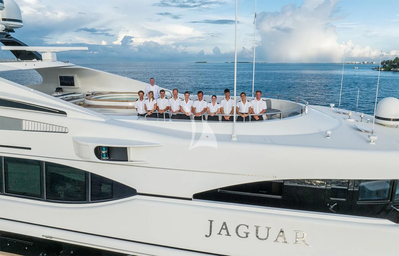 a group of people on a boat aboard JAGUAR Yacht for Charter