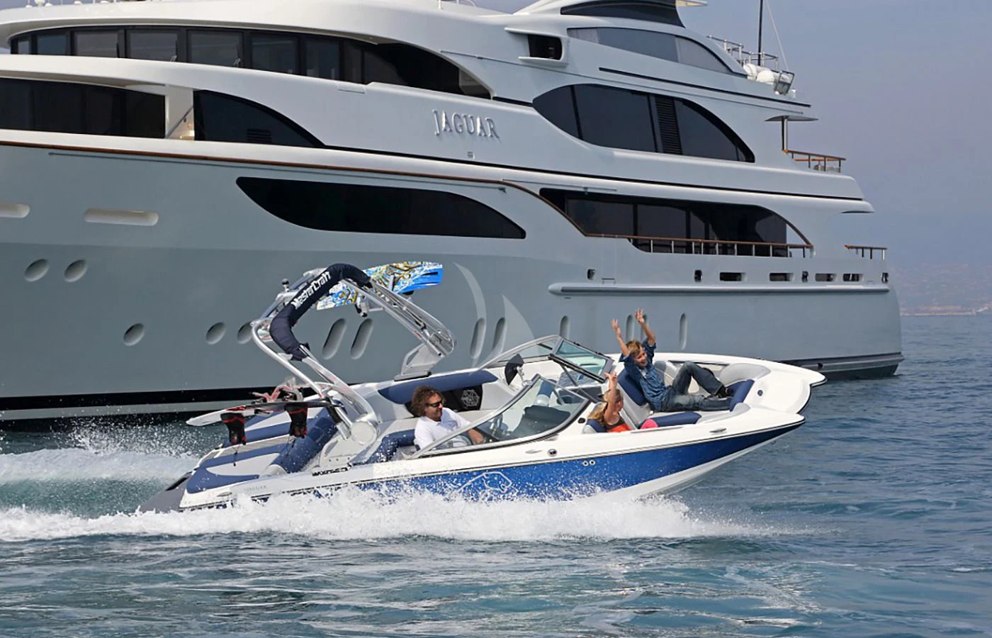 a couple of people on a boat aboard JAGUAR Yacht for Charter