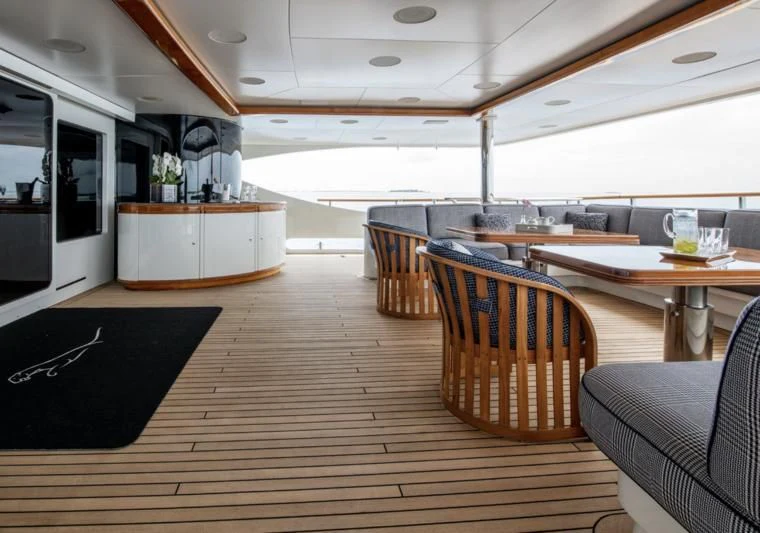 a room with a wood floor and a wood floor aboard JAGUAR Yacht for Charter