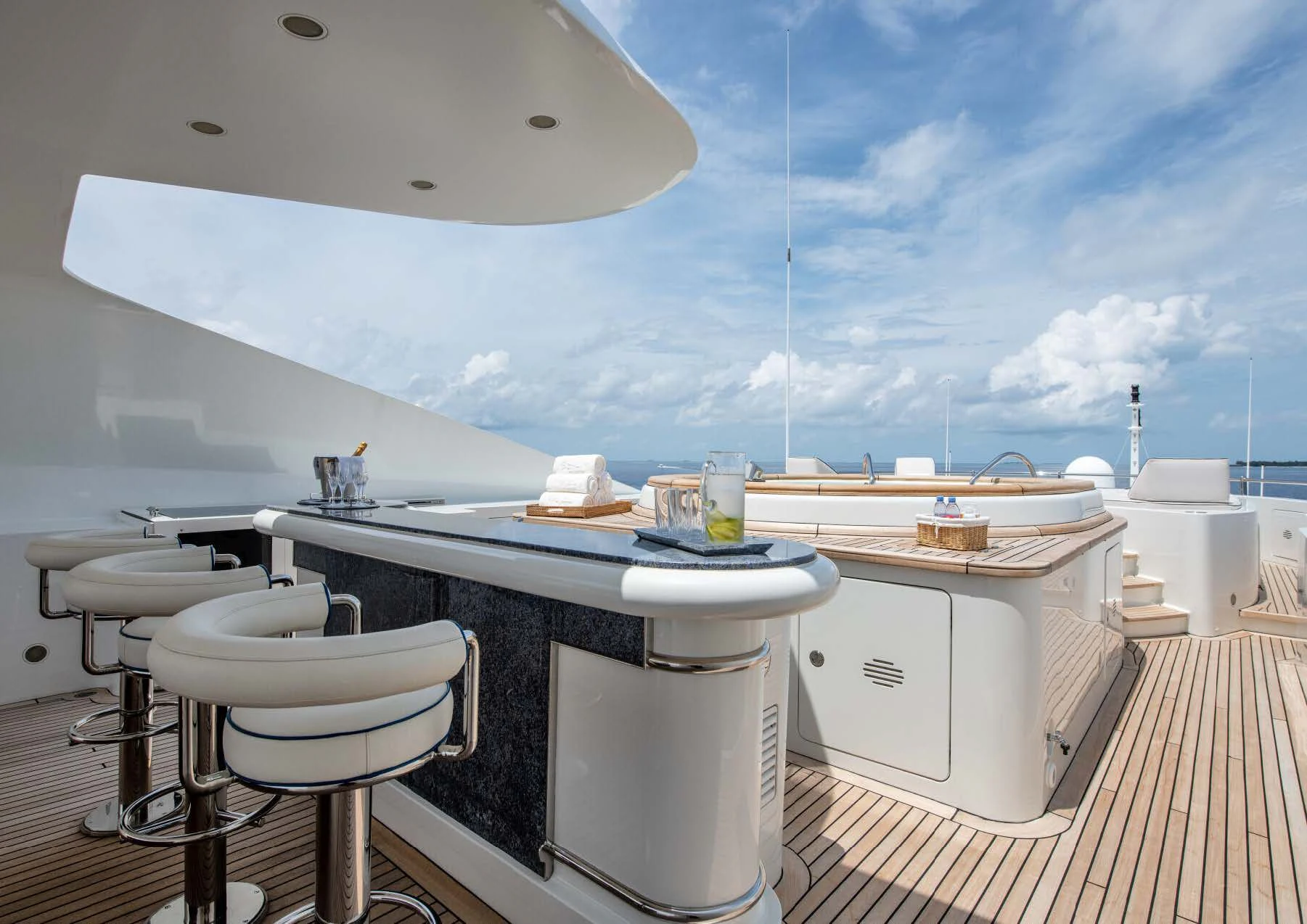 a white kitchen with a large window aboard JAGUAR Yacht for Charter