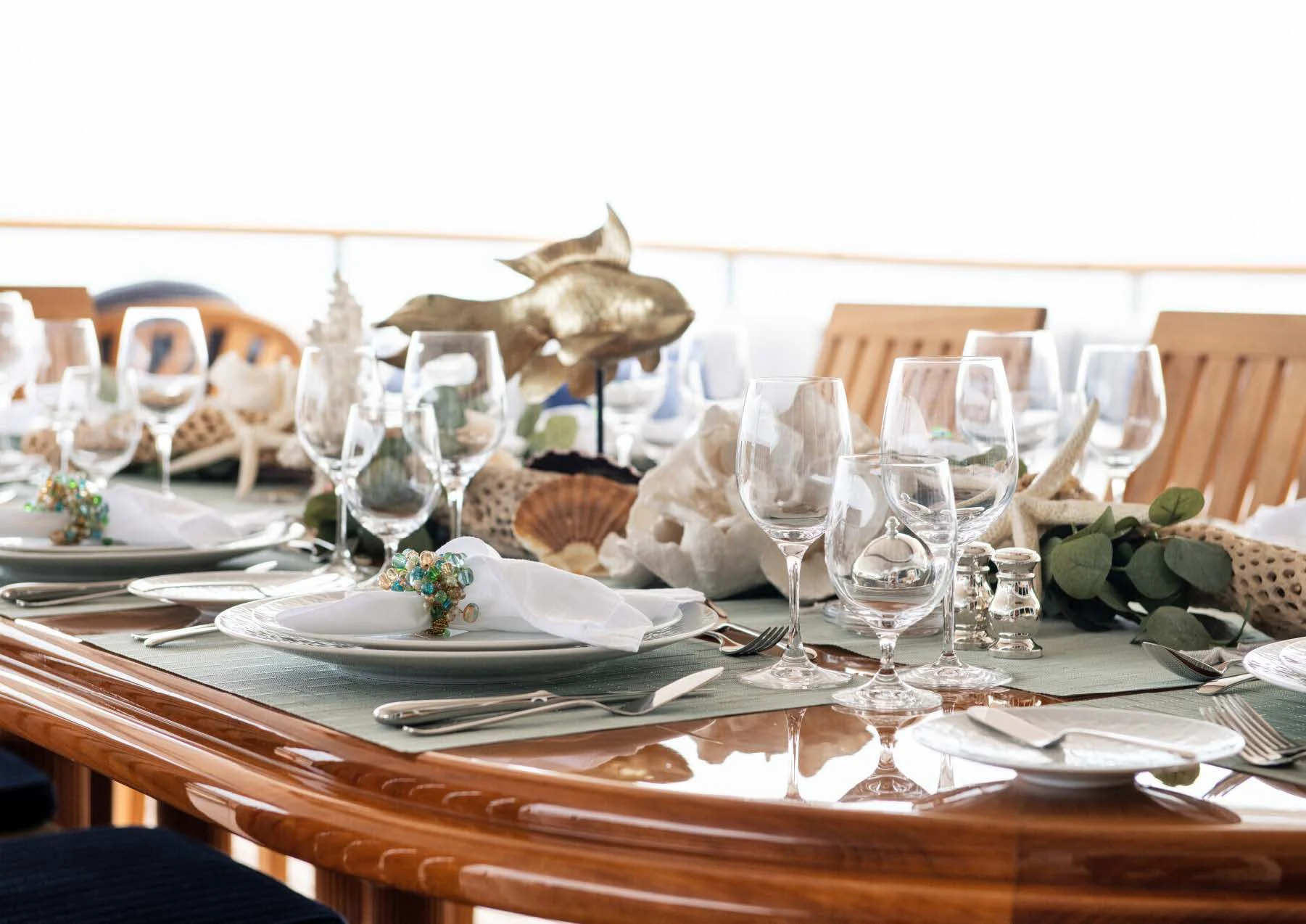 a table set with silverware and silverware aboard JAGUAR Yacht for Charter