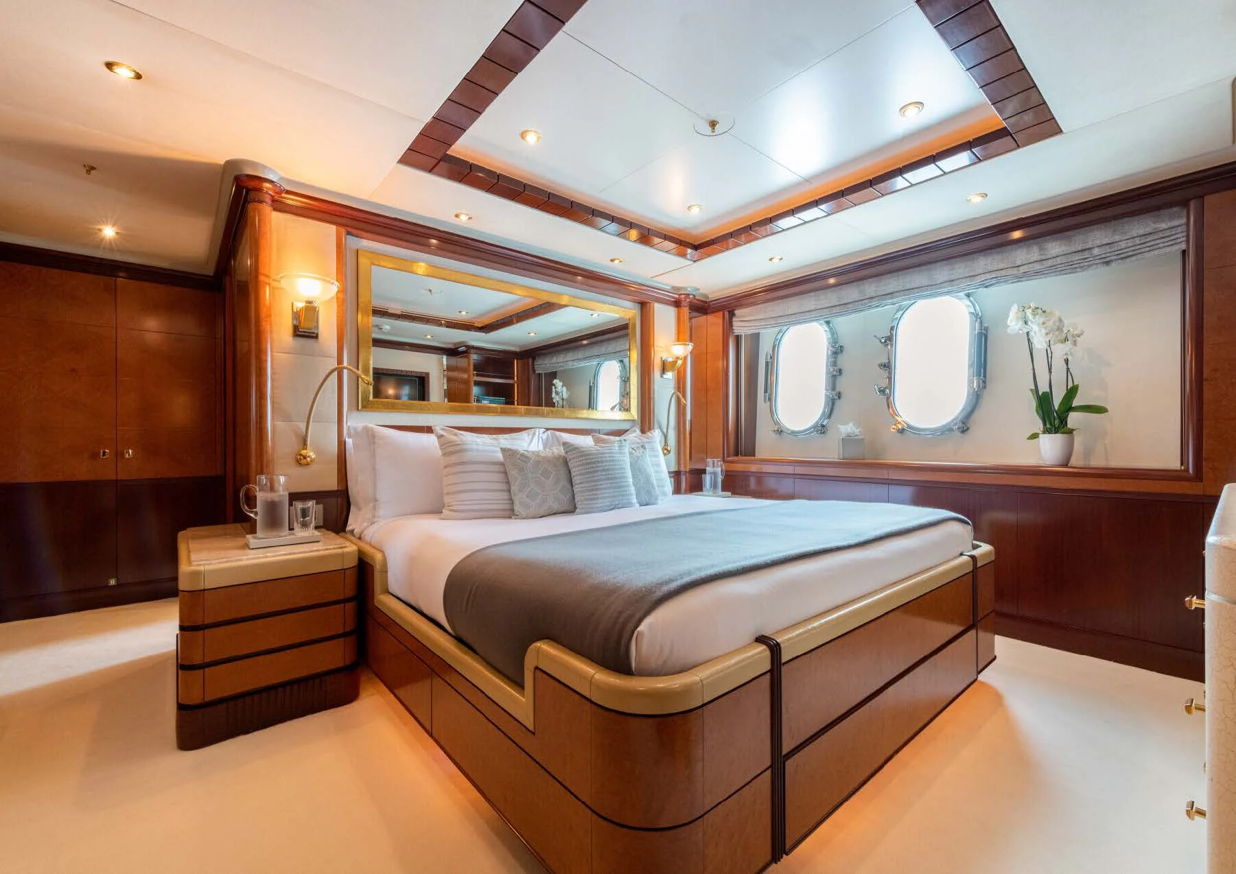 a large bedroom with a large bed aboard JAGUAR Yacht for Charter