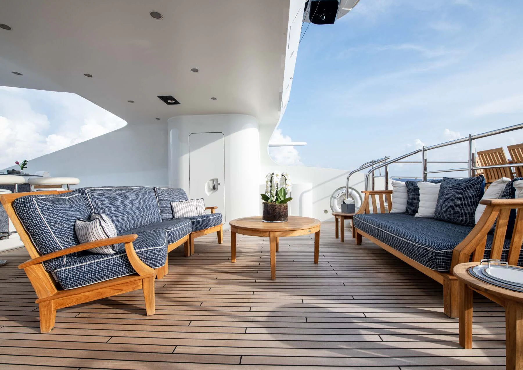 a living room with a large balcony aboard JAGUAR Yacht for Charter