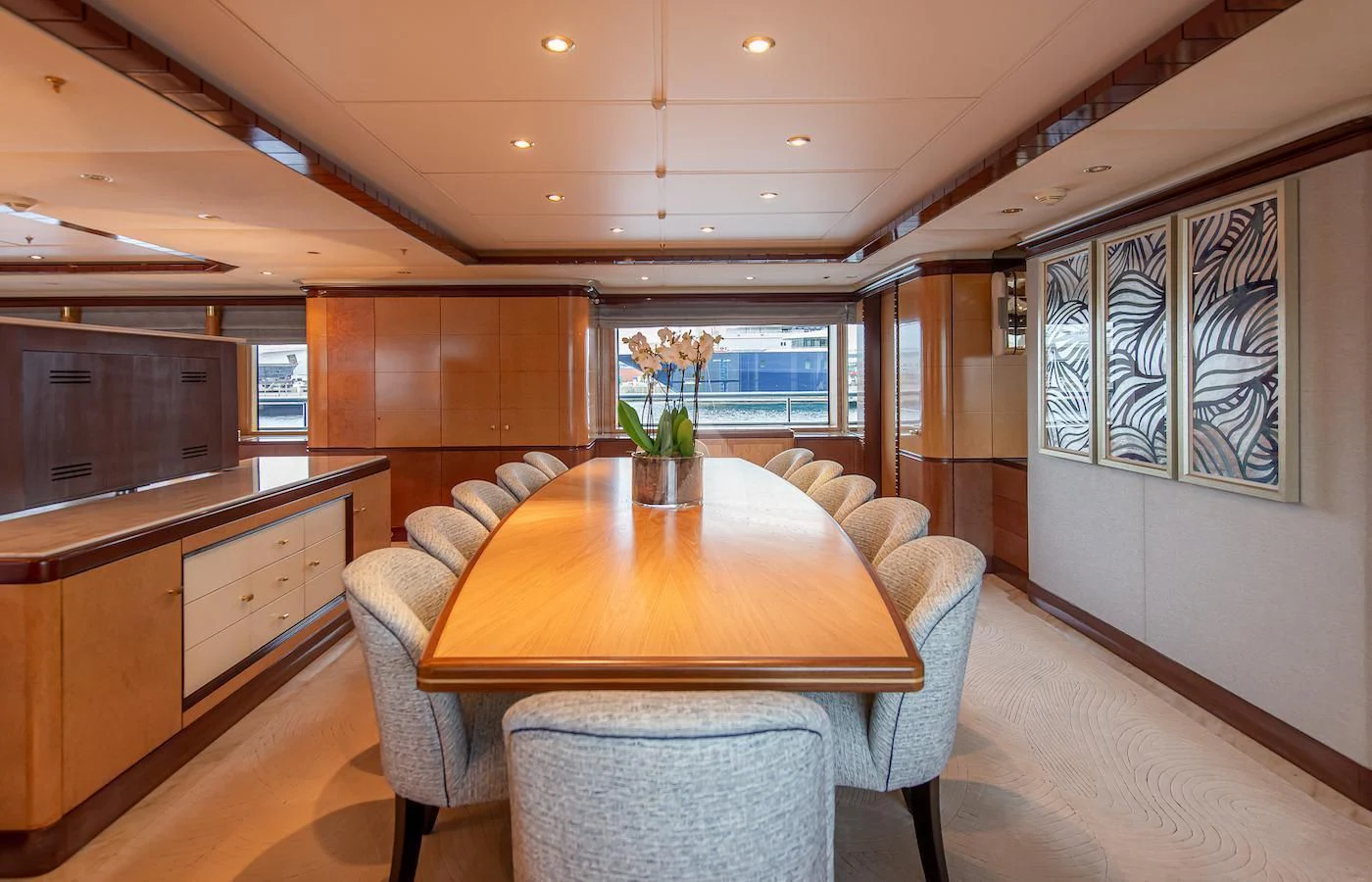 a large room with a table and chairs aboard JAGUAR Yacht for Charter
