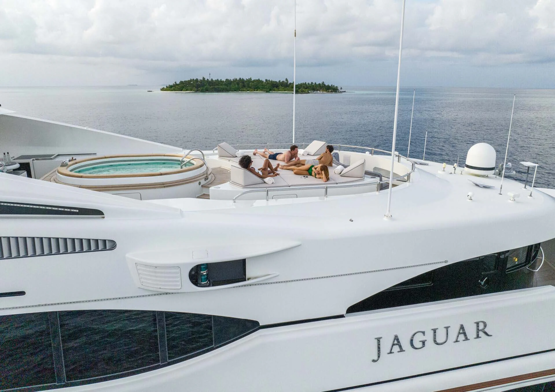 a group of people on a boat aboard JAGUAR Yacht for Charter