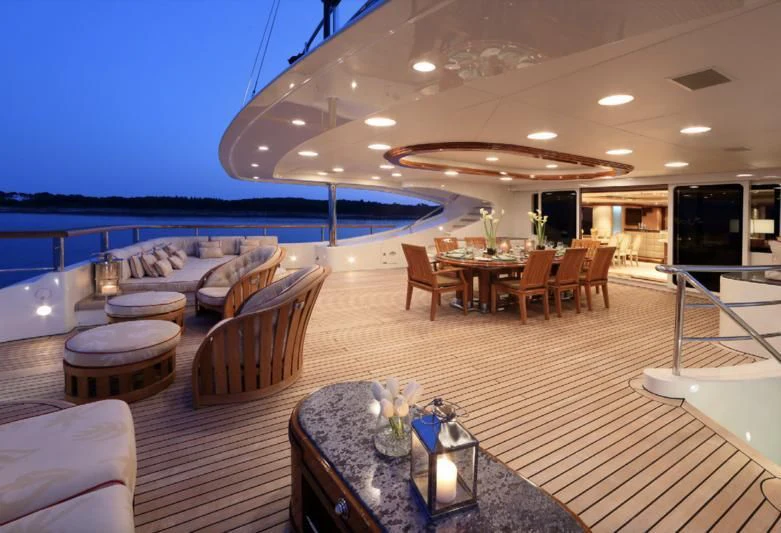 a large room with a table and chairs aboard JAGUAR Yacht for Charter