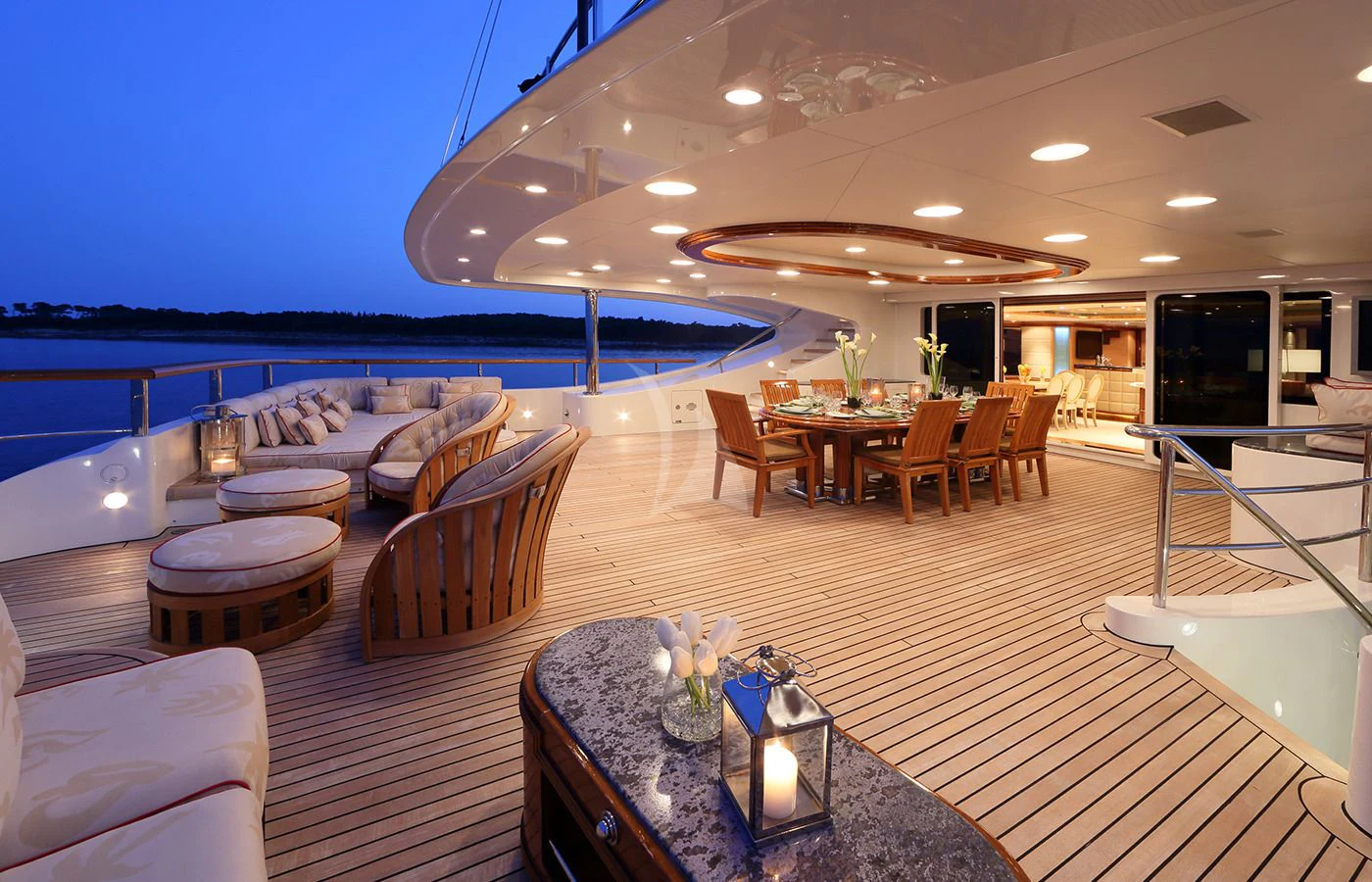 a large room with tables and chairs aboard JAGUAR Yacht for Charter