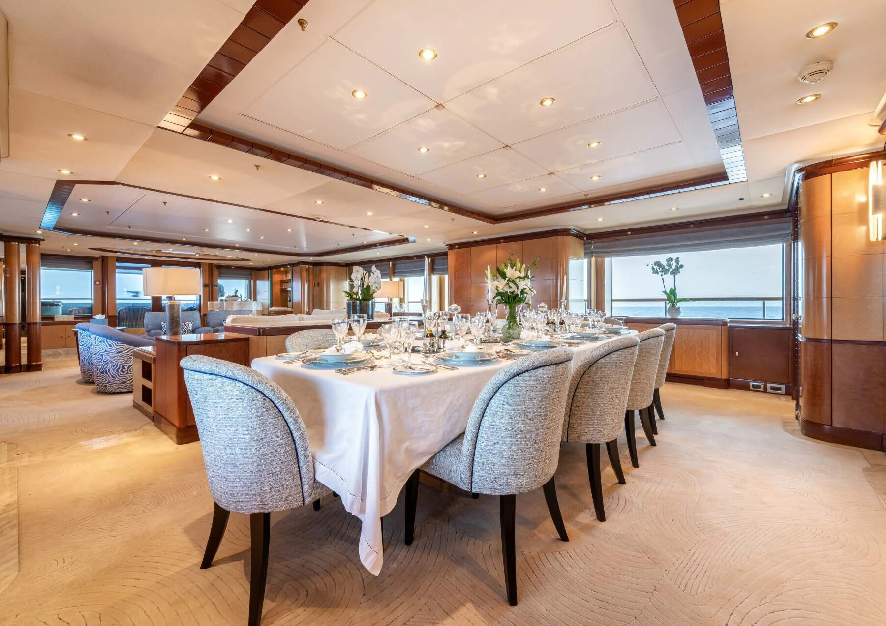 a large dining table in a large room aboard JAGUAR Yacht for Charter