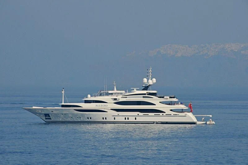 a large white yacht in the water aboard JAGUAR Yacht for Charter