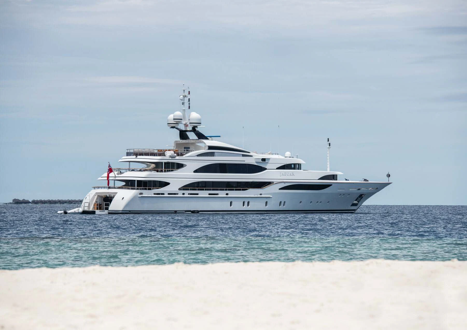 a white boat in the water aboard JAGUAR Yacht for Charter