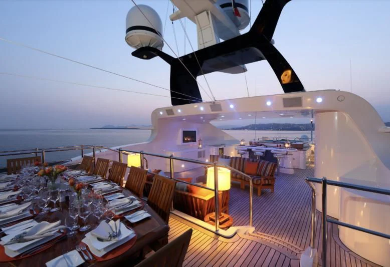 a ship with tables and chairs aboard JAGUAR Yacht for Charter