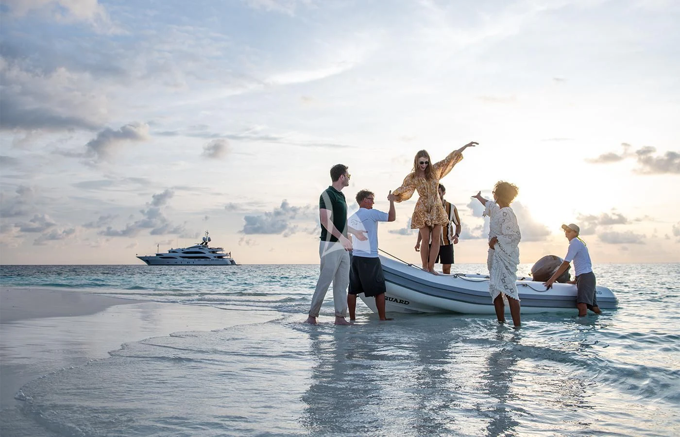 a group of people on a boat aboard JAGUAR Yacht for Charter