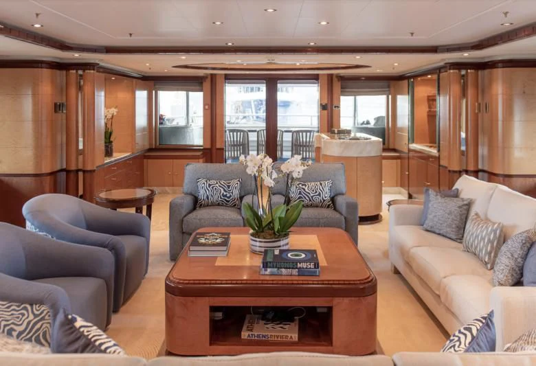 a living room with a table and chairs aboard JAGUAR Yacht for Charter