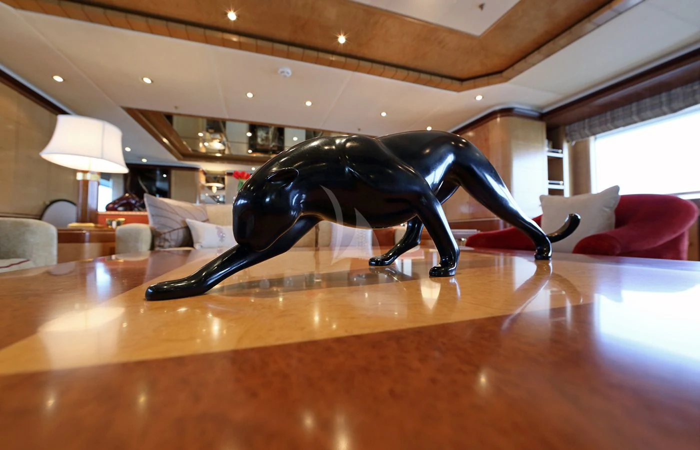 a statue of a dinosaur aboard JAGUAR Yacht for Charter