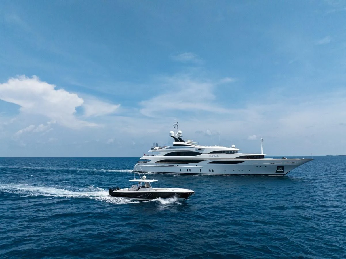 a white yacht on the water aboard JAGUAR Yacht for Charter