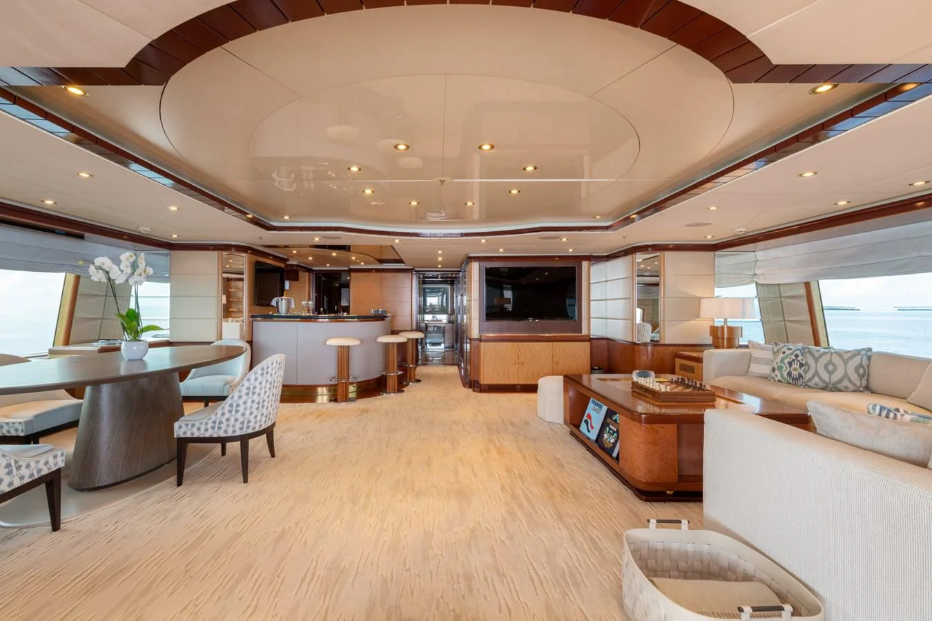 a living room with a large window aboard JAGUAR Yacht for Charter