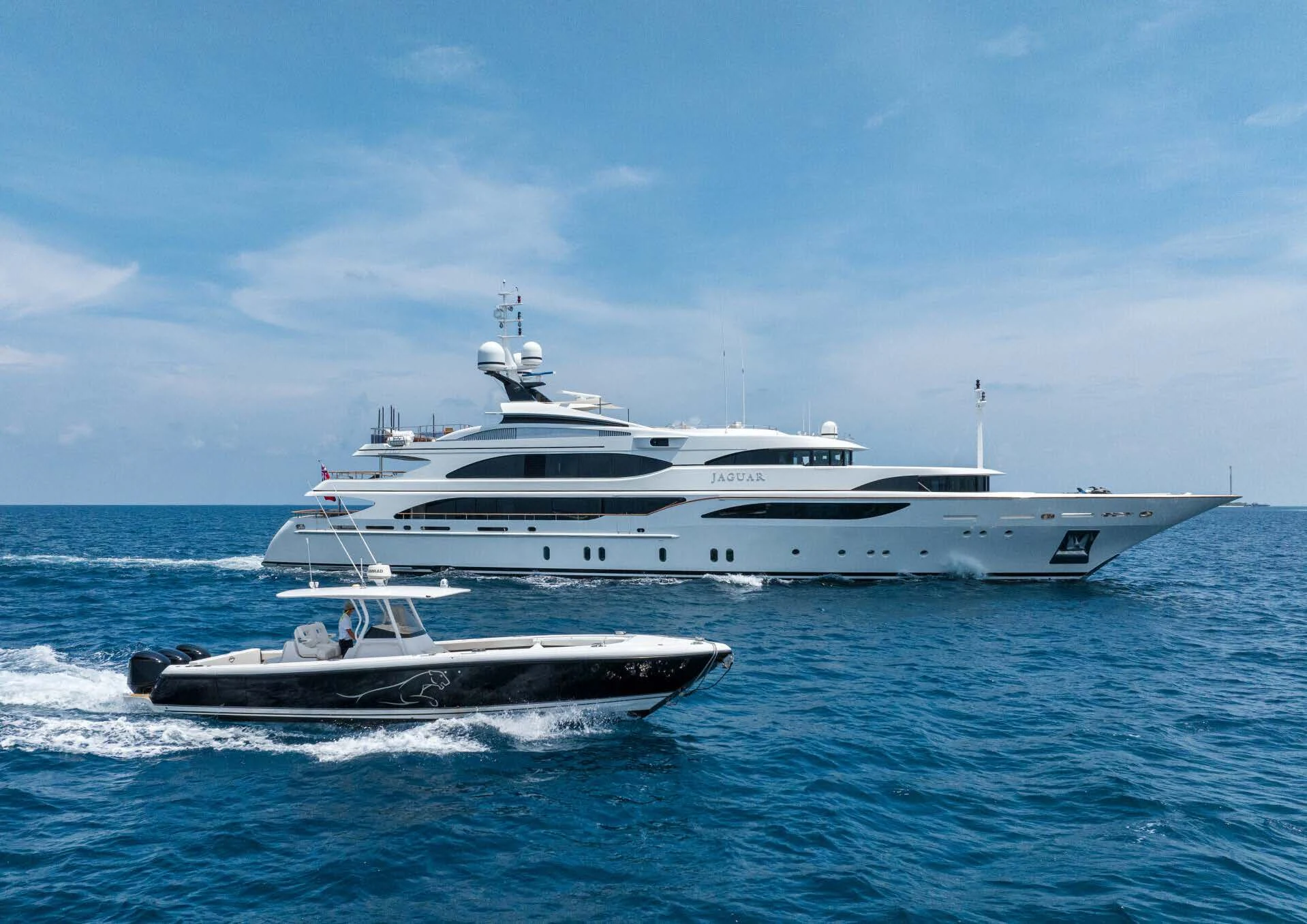 a white yacht in the water aboard JAGUAR Yacht for Charter